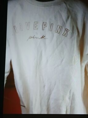 Victoria's Secret PINK Brown Logo Garment Tag Close-Up